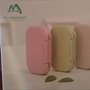 New, travel size pill organizers.